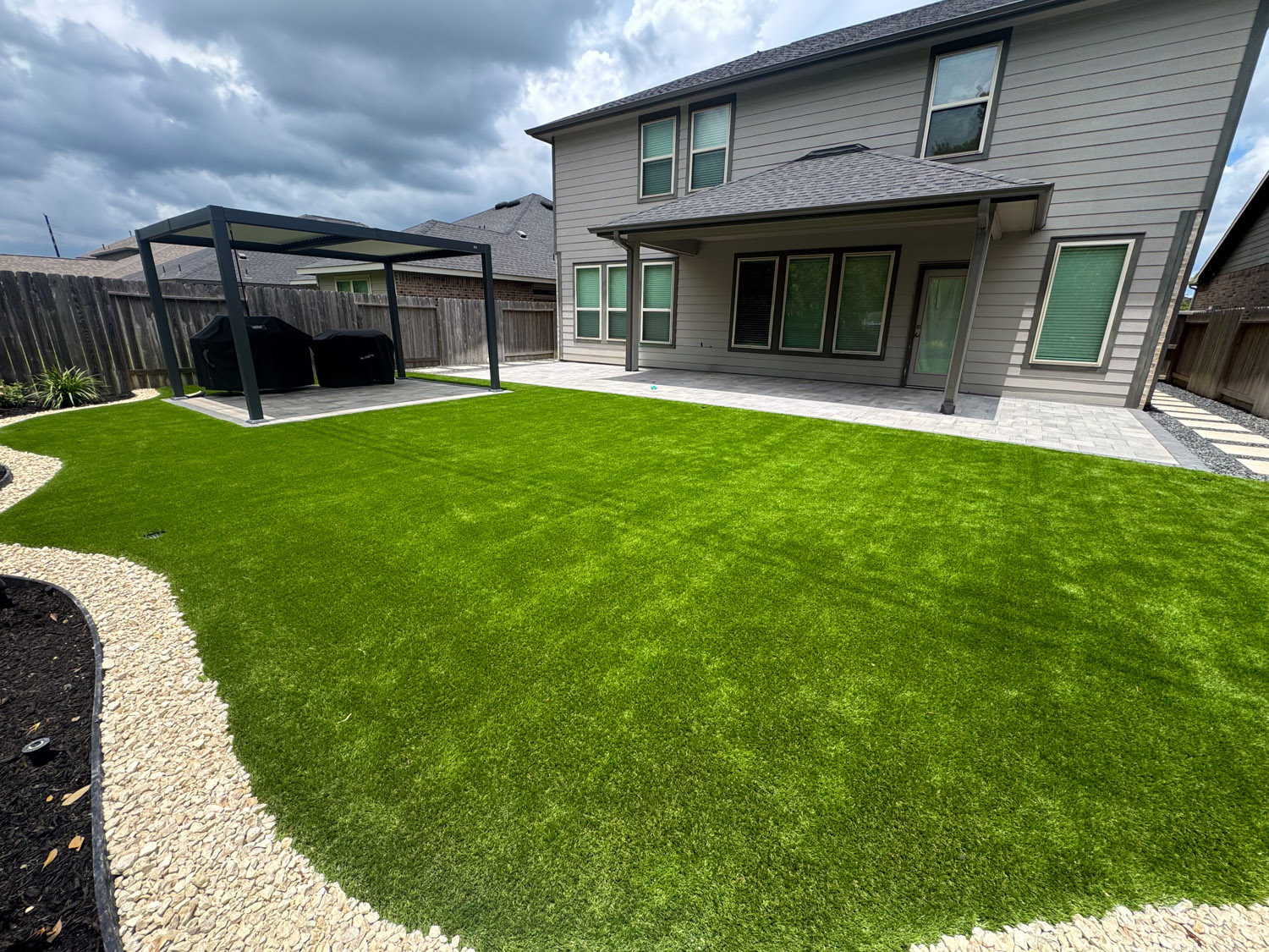 bezuz-landscaping-and-design-artificial-turf-gravel-border-patio