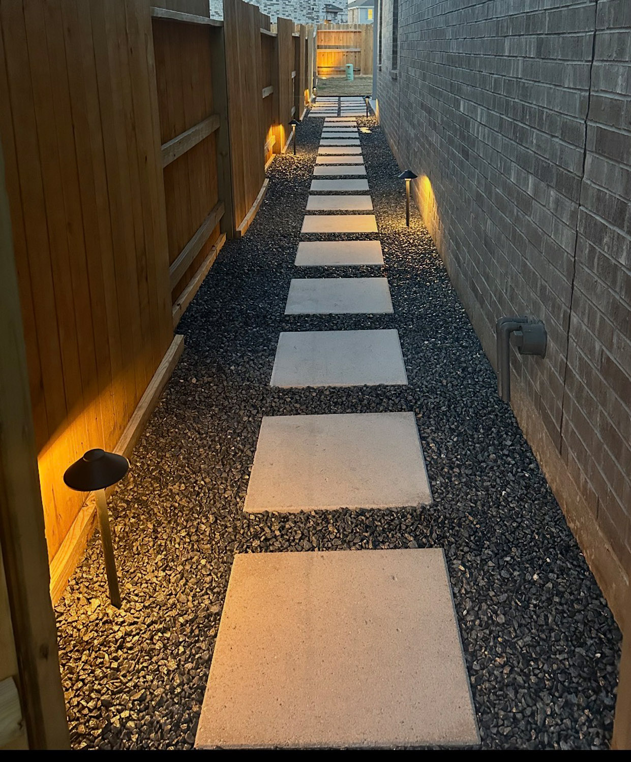 Bezuz-Landscaping-and-Design-commercial-illuminated-paver-pathway-lighting