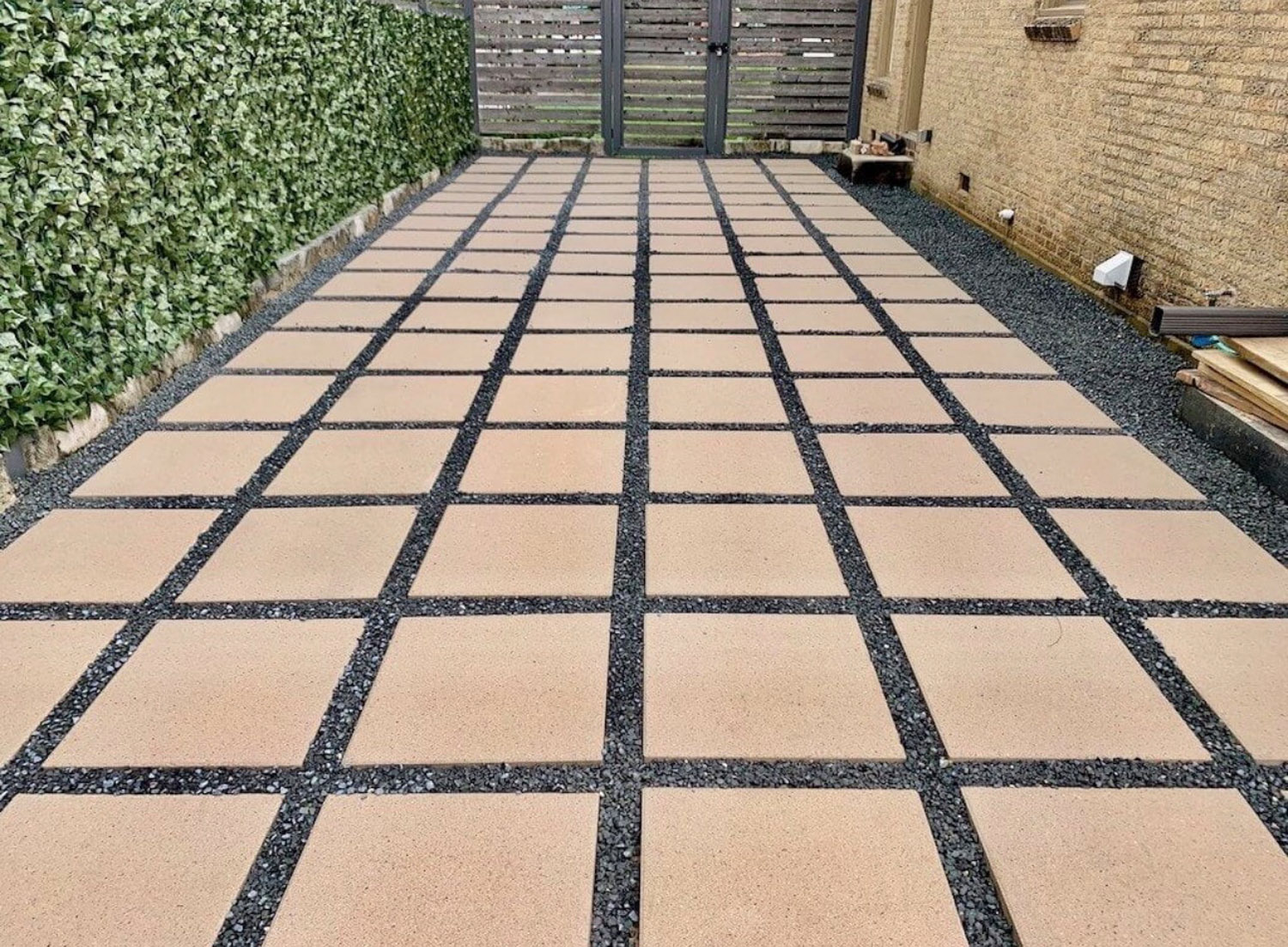 Bezuz-Landscaping-and-Design-commercial-square-paver-grid-patio