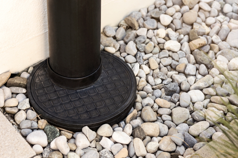 Bezuz-Landscaping-and-Design-french-drain-downsprout-close-up