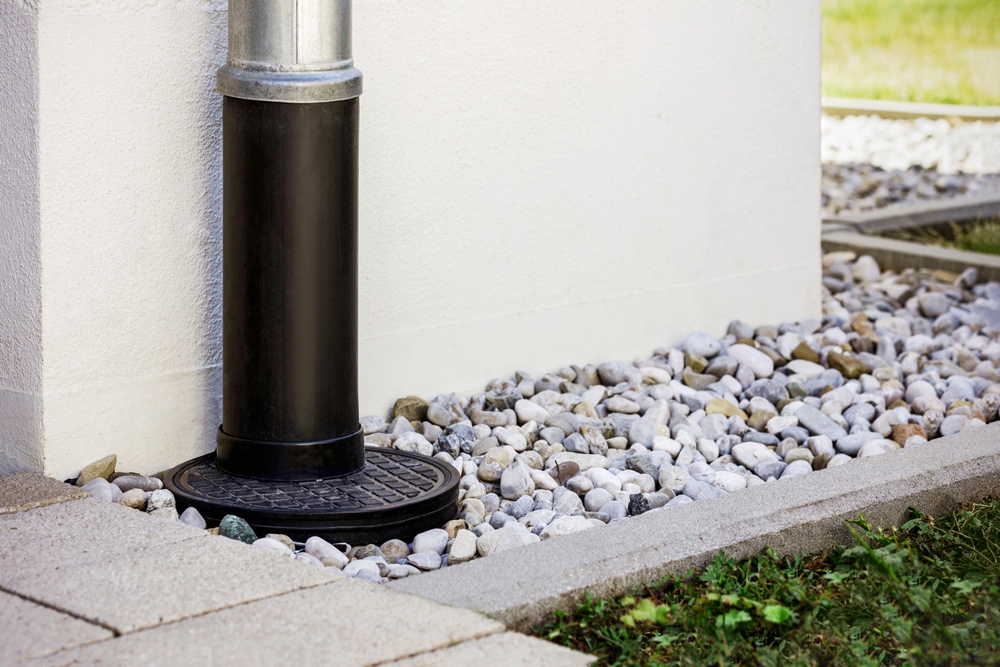 Bezuz-Landscaping-and-Design-french-drain-downsprout
